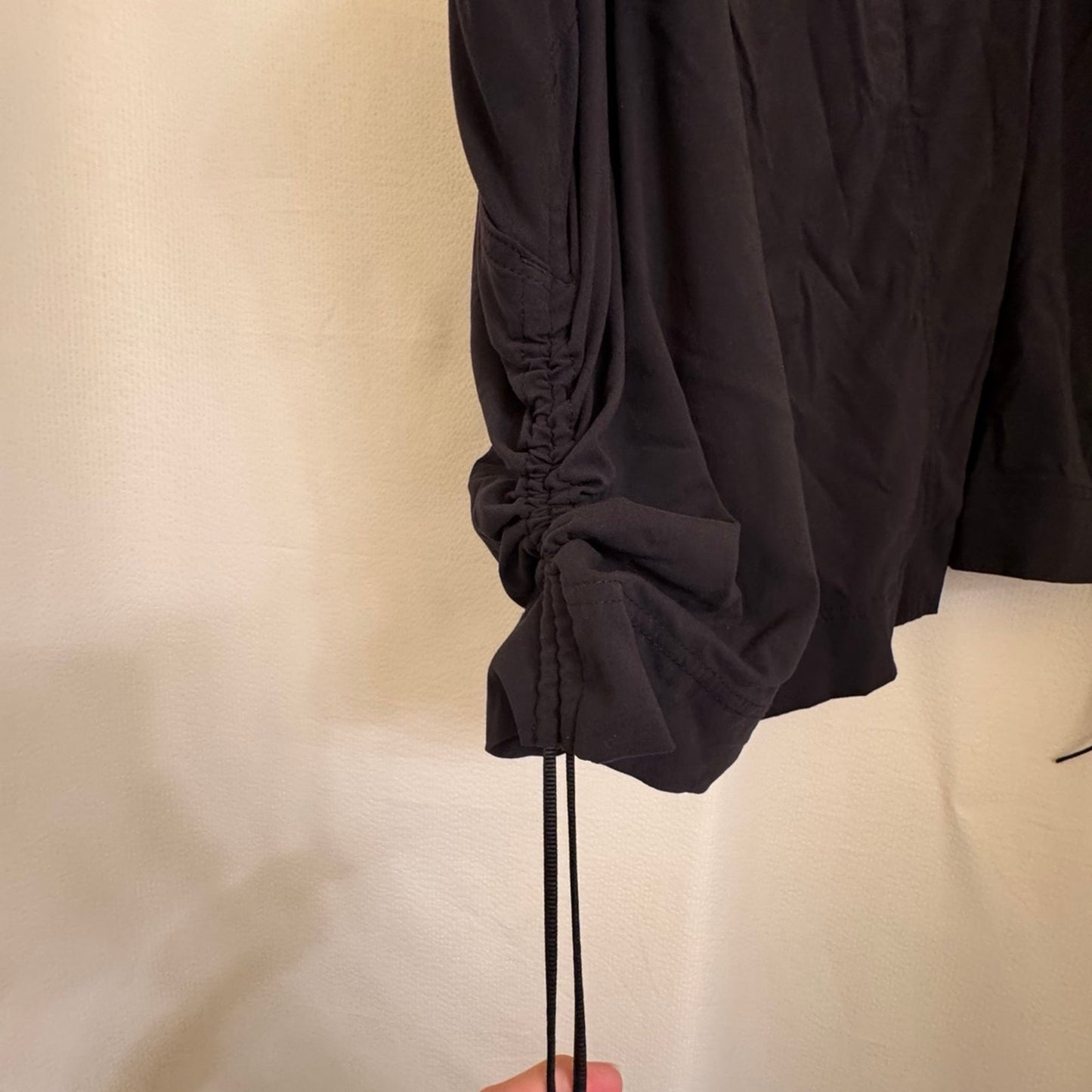 Black Columbia black skort with cinch pulls on both sides.