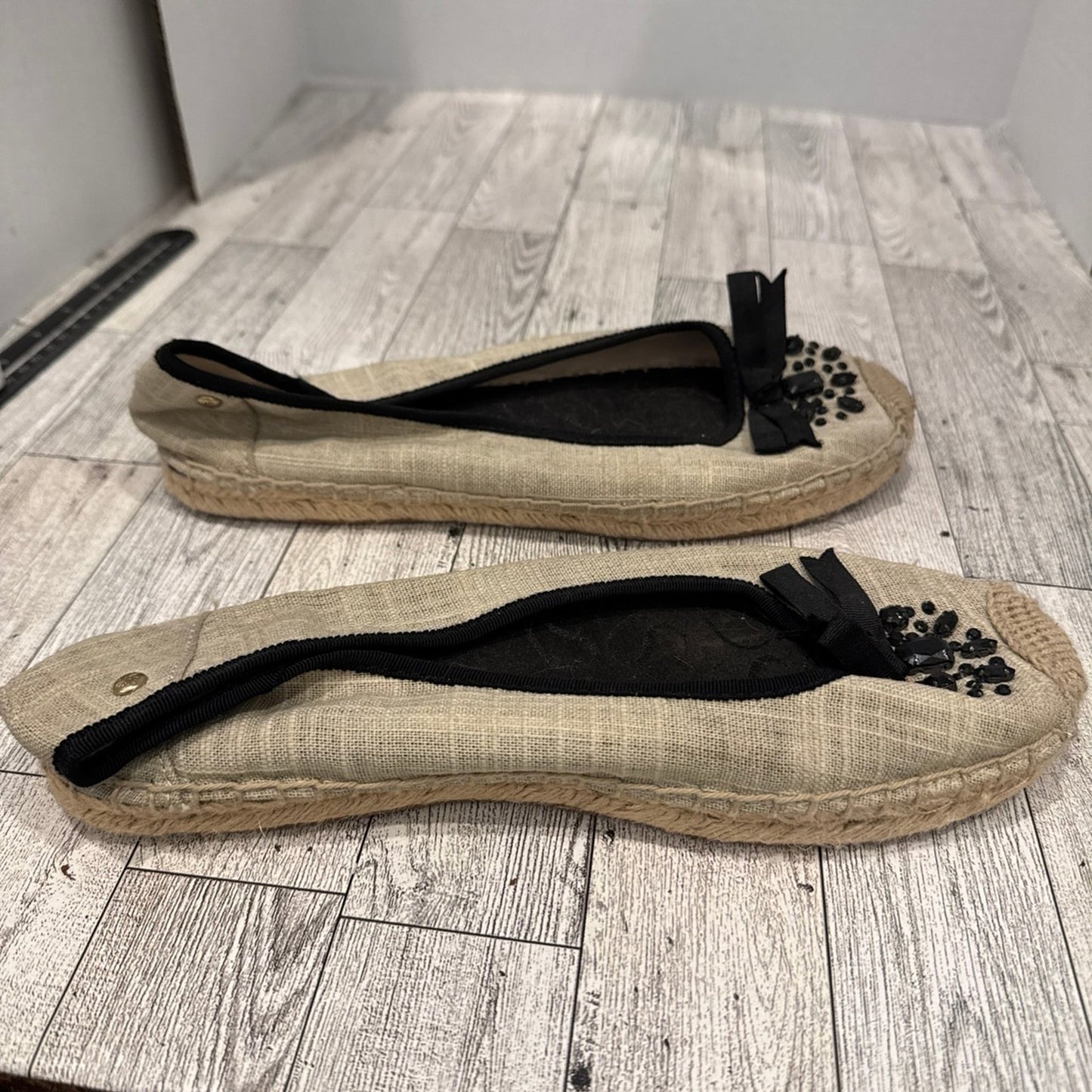 Vera Wang ballet flats with black gem detail with a small bow