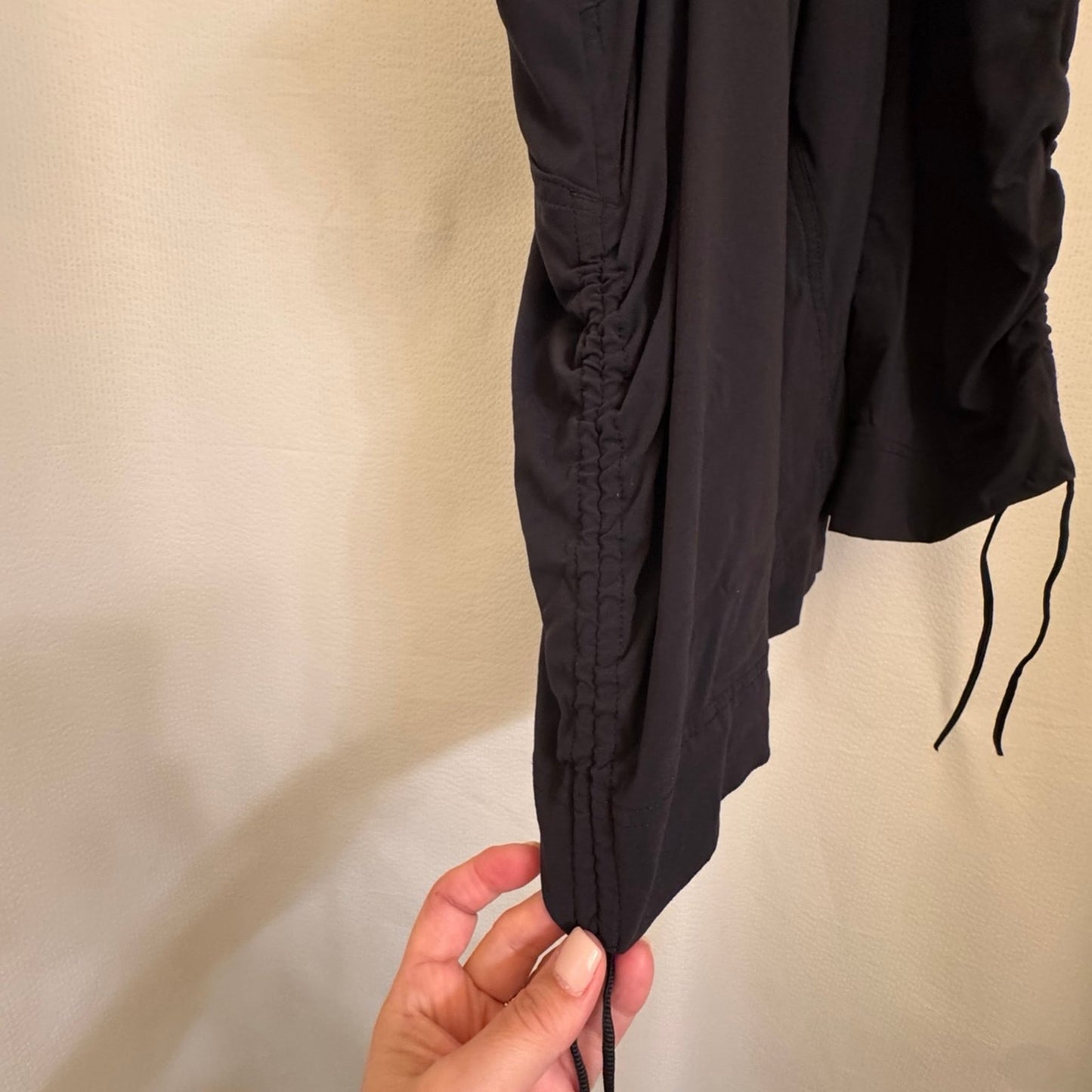 Black Columbia black skort with cinch pulls on both sides.