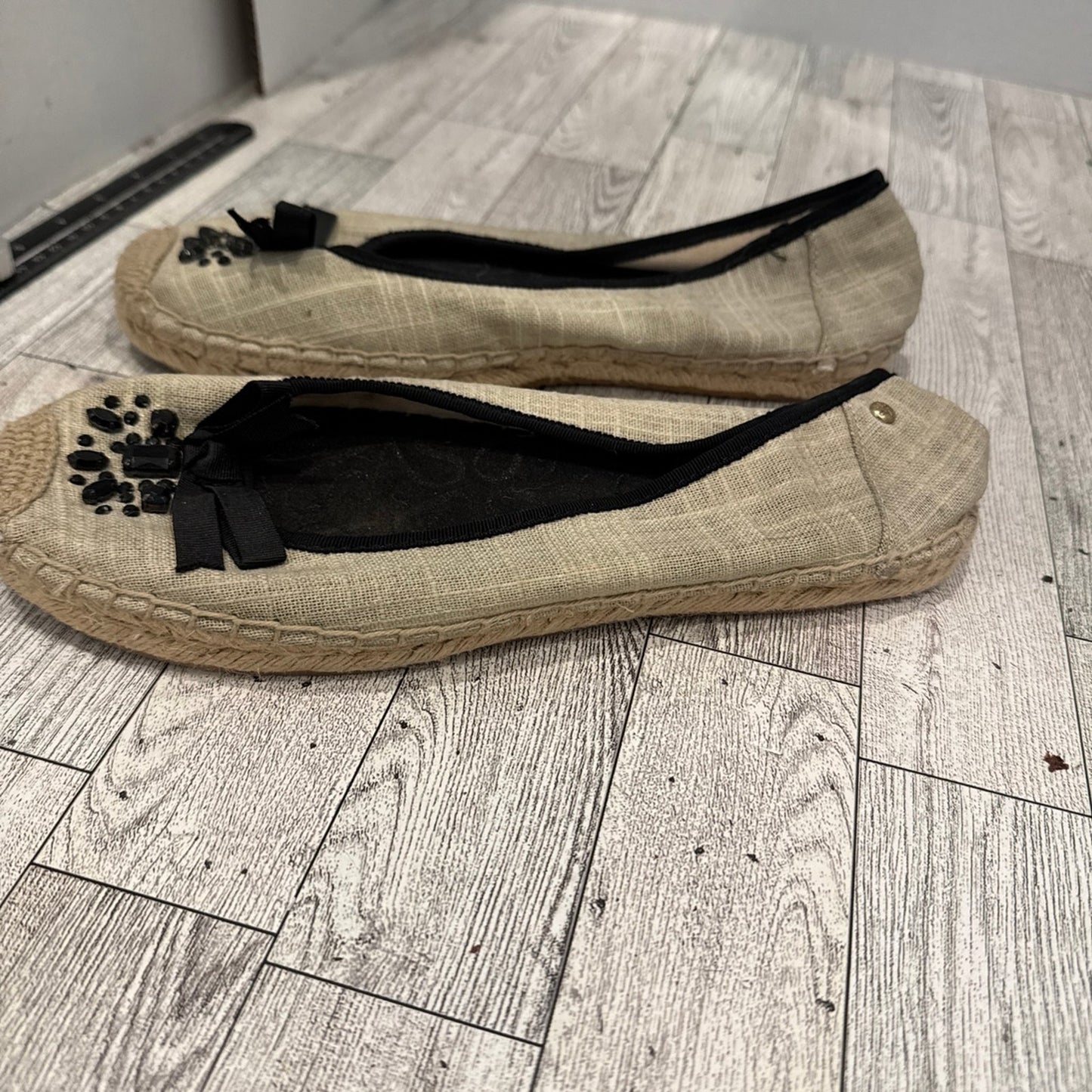 Vera Wang ballet flats with black gem detail with a small bow