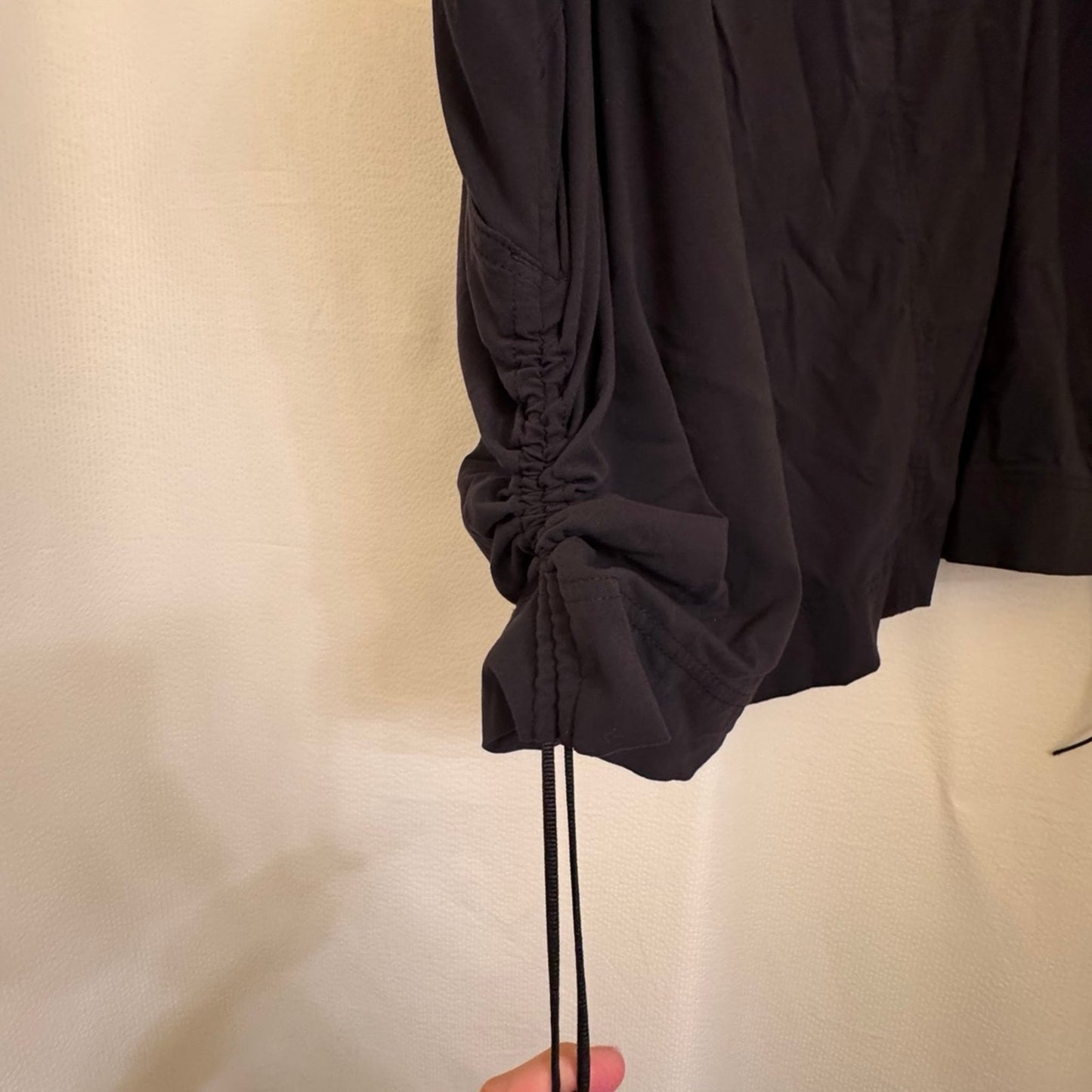 Black Columbia black skort with cinch pulls on both sides.