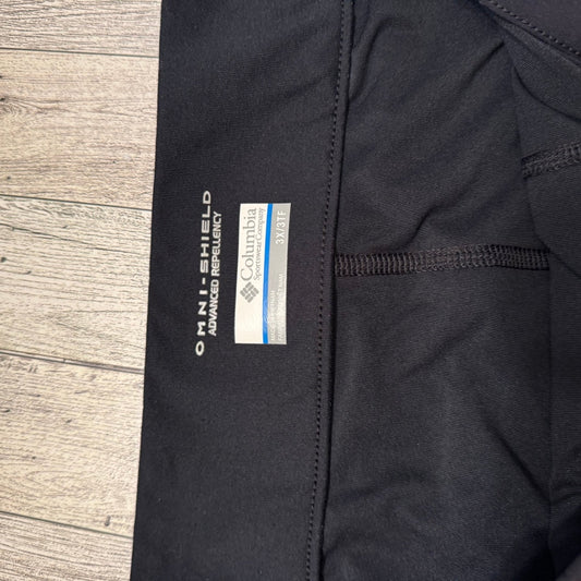 Black Columbia black skort with cinch pulls on both sides.